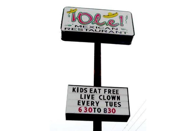 funny restaurant sign eating clown