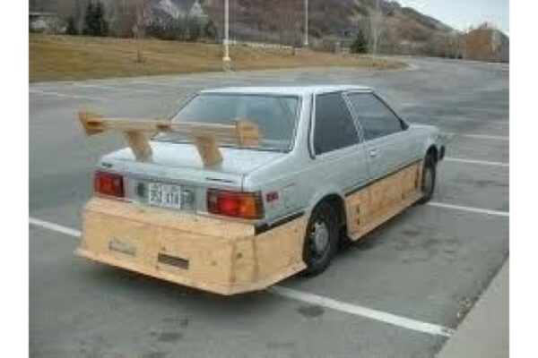 Funny Redneck Tuner photo, using lumber on a car
