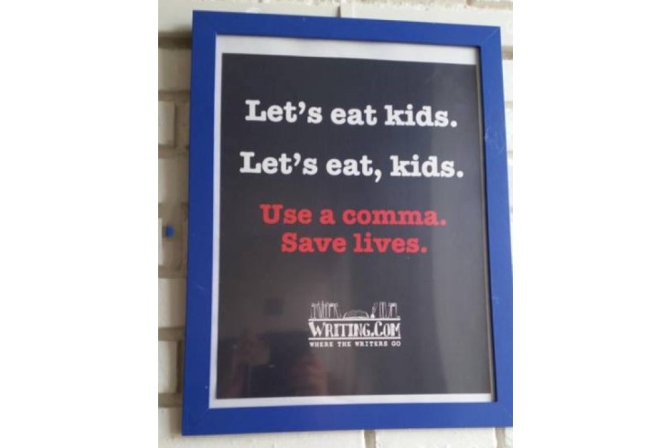 Funny sign says Commas Saves Lives