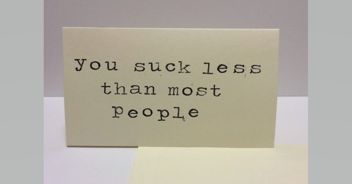 funny Suck Less Valentine image says you suck less than most people